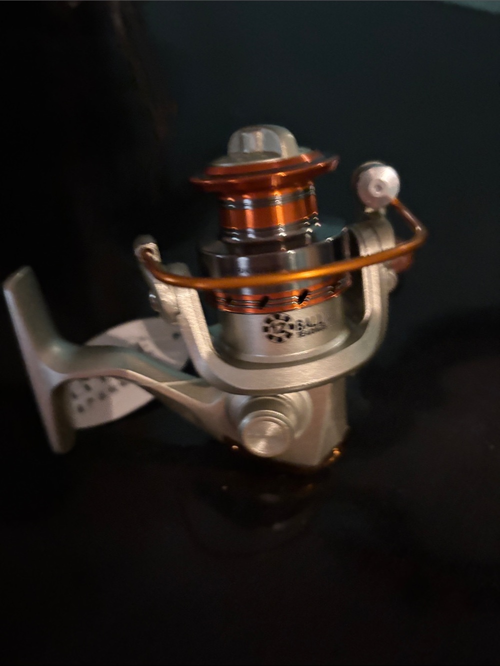 Lightweight Spinning Reel in Silver and Copper-Tone